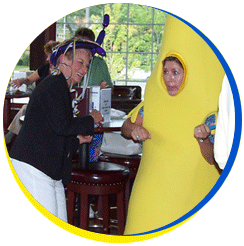 The Banana Lady dancing at a corporate birthday party